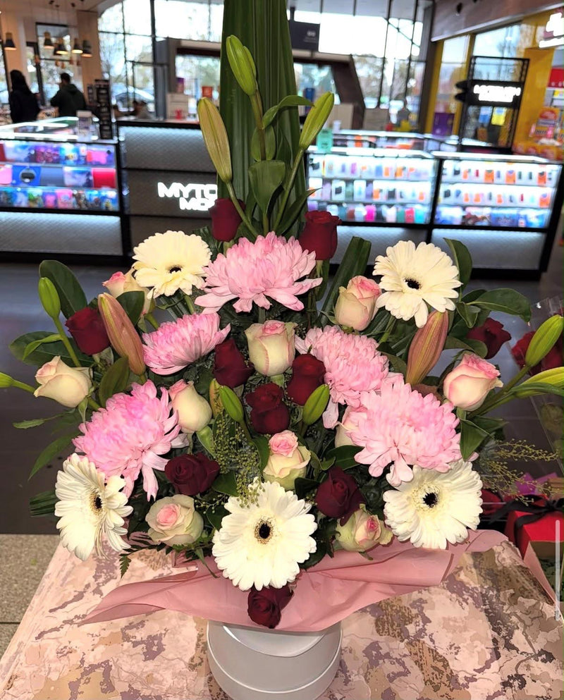 Pretty Petals Hat Box Arrangement